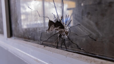 Bullet hole caused by shooting in the operating room of the Zalingei teaching hospital, Central Darfur state, Sudan.