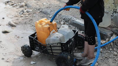 Collecting water Gaza