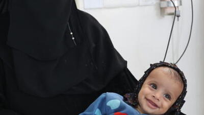 A mother and child in the maternity ward at Al Salam hospital in Khamer, Yemen.