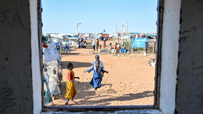 A girl plays in the Al- Mina Al Muwahad displacement camp in El-Obeid, Sudan