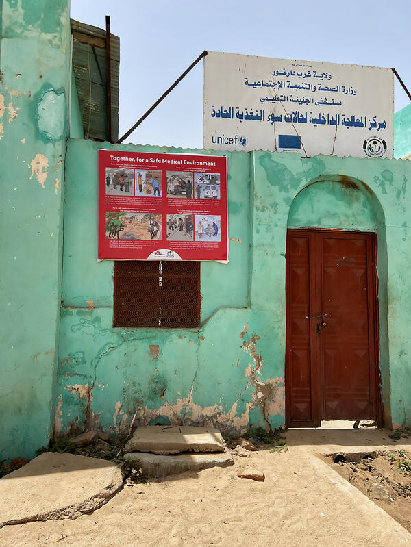 Awareness messages promoting safety and protection for patients and staff on the entrance of El Geneina Teaching Hospital, MSF-supported hospital in West Darfur.