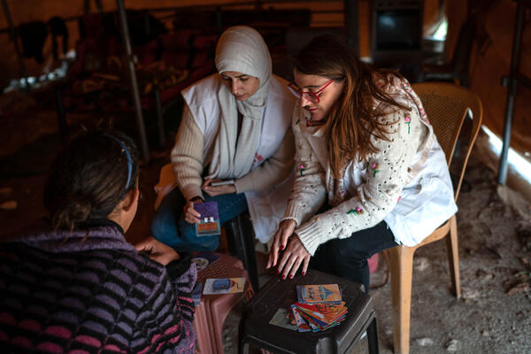 MSF workers attend a mental health session with Mustafa’s daughter Jinan, whose house was demolished by Israeli forces, in Douma on 13 April 2023.