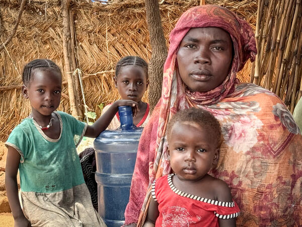 Portrait of Aziza Idriss and three of her children.