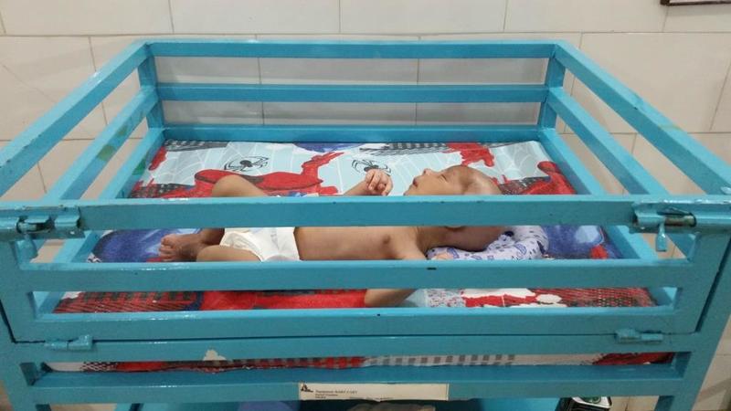 baby_shahida_in_cot.jpg baby_shahida_in_cot.jpg