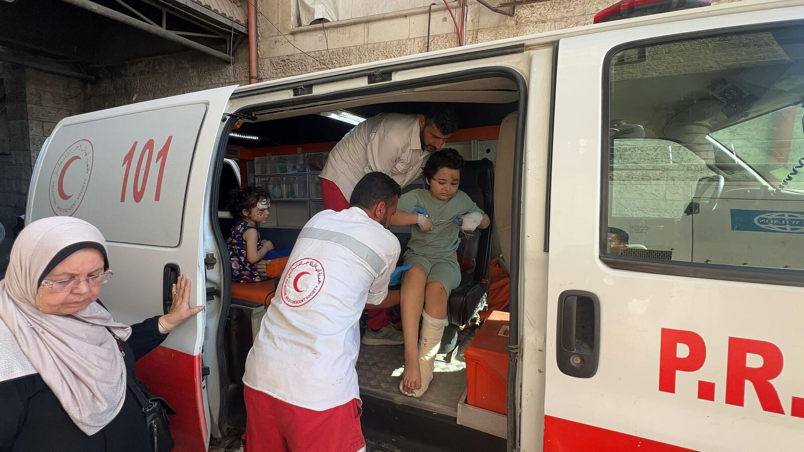 8-year-old Kareem and his 4-year-old sister Julia are being evacuated with their family from Gaza City to Al Aqsa Hospital in the southern Gaza Strip due to the lack of medical supplies.