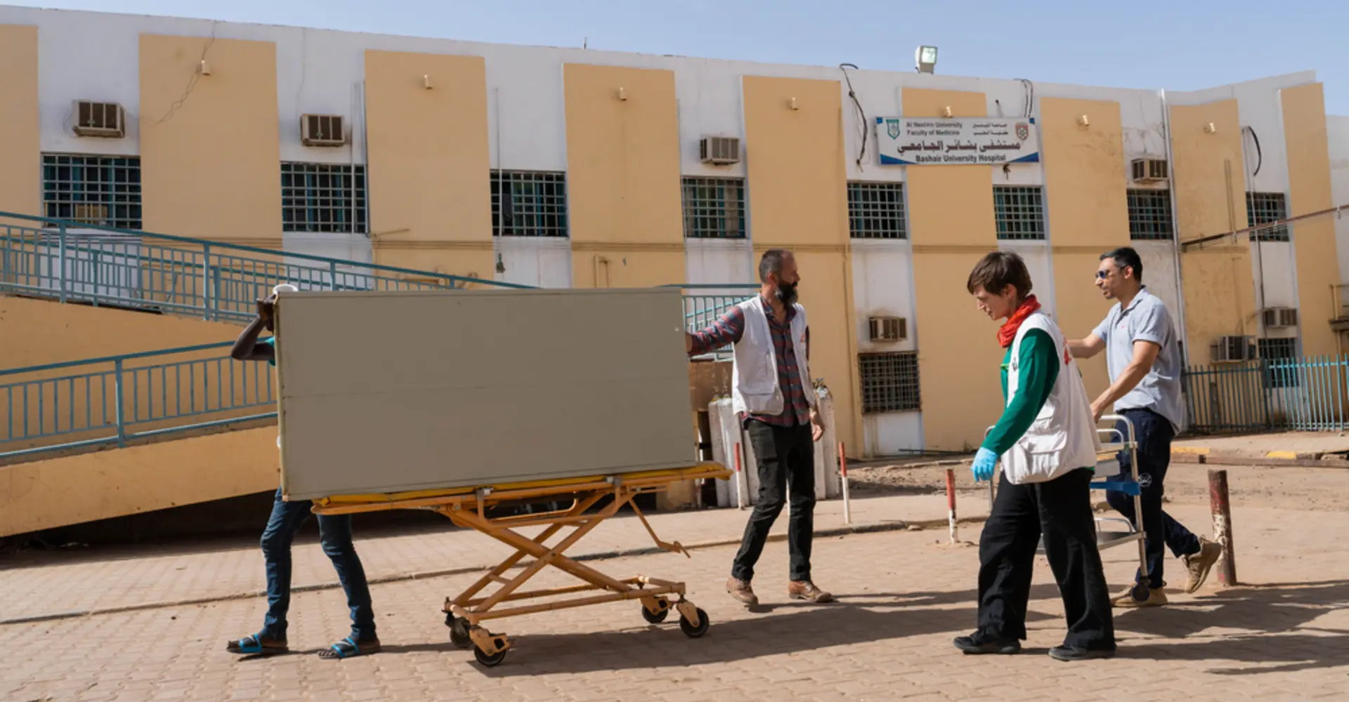 MSF staff and volunteers trying to work with what is available to get the hospital operational.