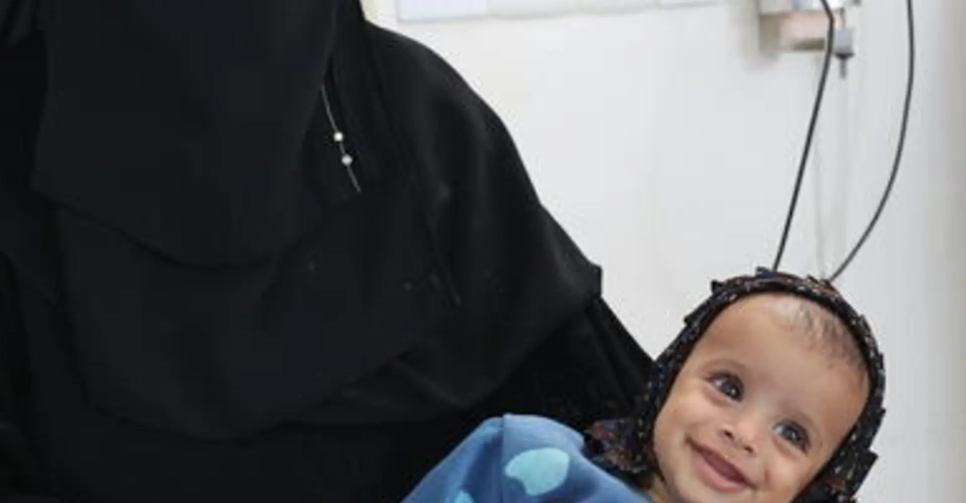 A mother and child in the maternity ward at Al Salam hospital in Khamer, Yemen.