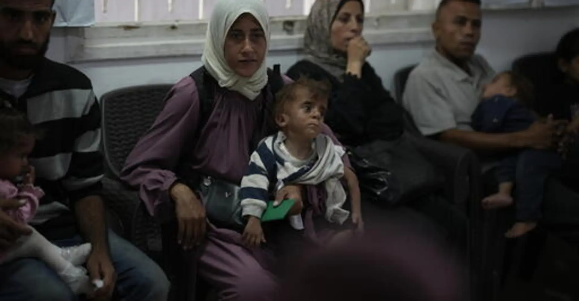 A Palestinian mother identified as Donia Alouf, 33 years old and her son 1 year old Ahmed, who was diagnosed with malnutrition