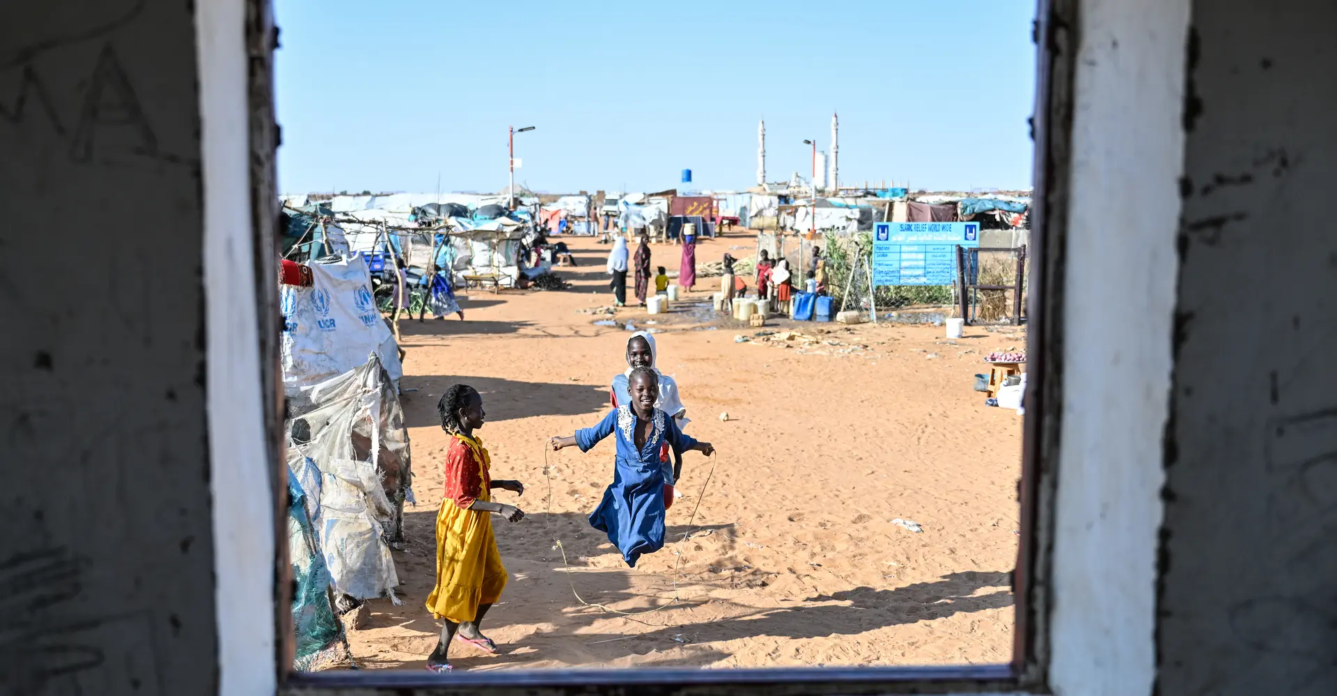 A girl plays in the Al- Mina Al Muwahad displacement camp in El-Obeid, Sudan