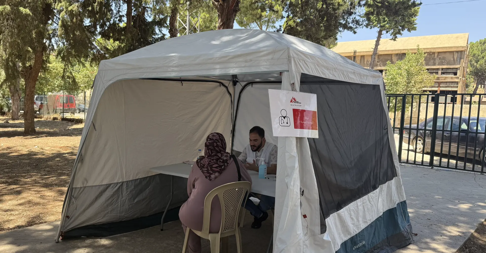 Patient with MSF doctor in Bekaa