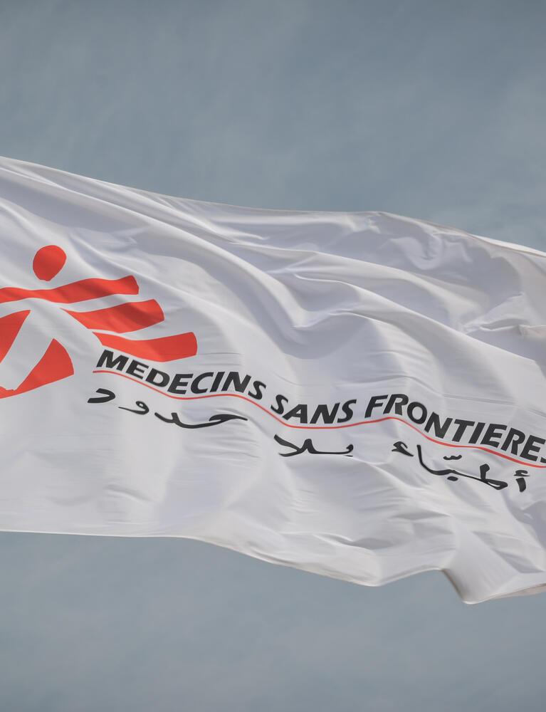 The MSF flag flutters in the wind at MSF’s clinic in Al-Tanideba camp for Tigray refugees, in Eastern Sudan.