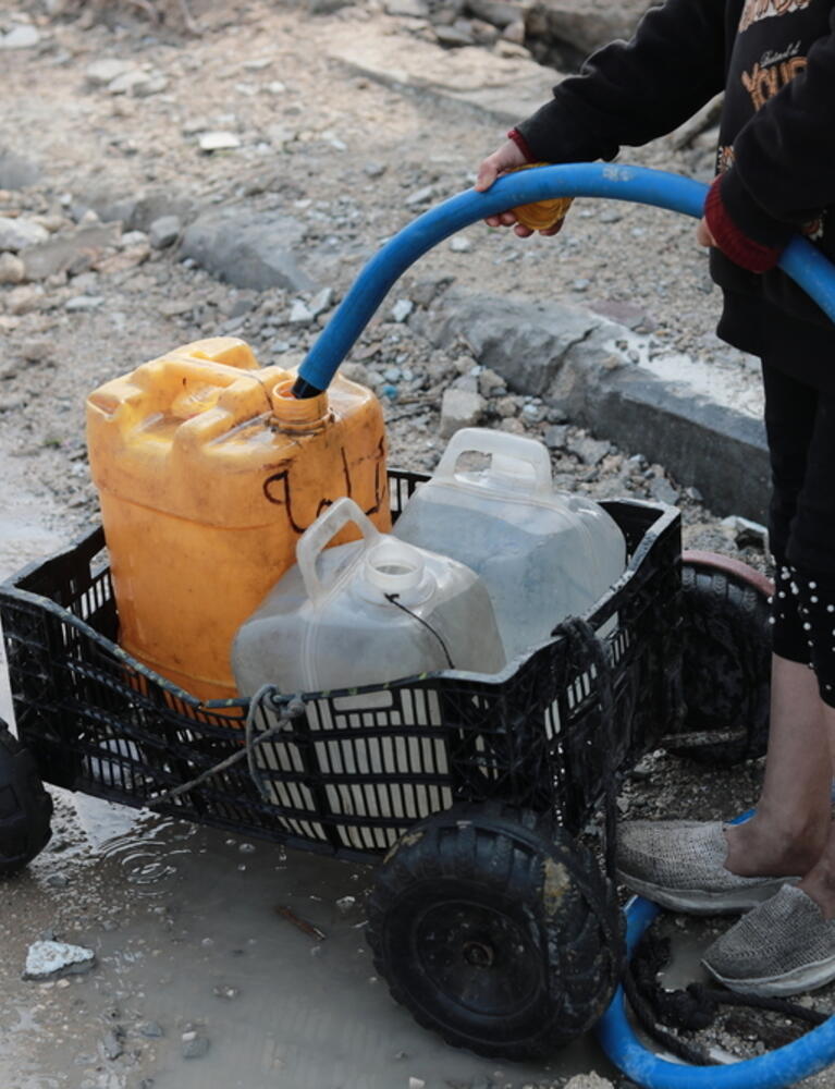 Collecting water Gaza